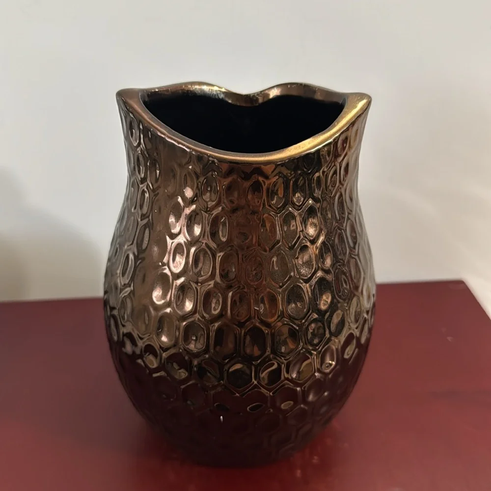 Copper/Bronze colored ceramic owl vase with a dimpled, metallic finish